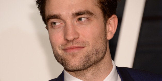 Robert Pattinson arrives at the 2015 Vanity Fair Oscar Party on Sunday, Feb. 22, 2015, in Beverly Hills, Calif. (Photo by Eva