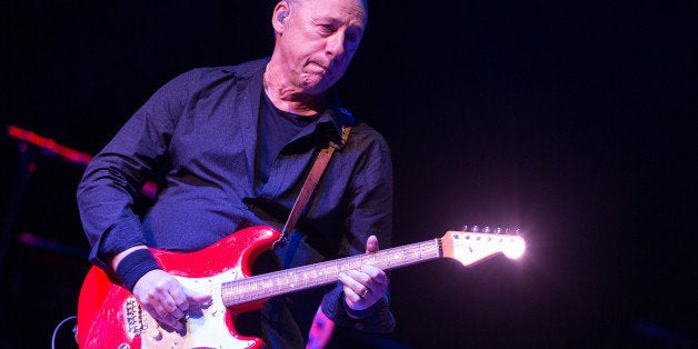 Mark Knopfler performs in concert at The Wiltern on Saturday, Oct. 26, 2013 in Los Angeles. (Photo by Paul A. Hebert/Invision/AP)