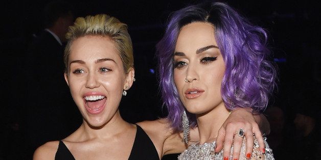 LOS ANGELES, CA - FEBRUARY 08: Recording Artists Miley Cyrus and Katy Perry attend The 57th Annual GRAMMY Awards at the STAPLES Center on February 8, 2015 in Los Angeles, California. (Photo by Larry Busacca/Getty Images for NARAS)