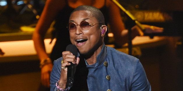 FILE - In this Feb. 10, 2015 file photo, Pharrell Williams performs at "Stevie Wonder: Songs in the Key of Life - An All-Star Grammy Salute," in Los Angeles. Williams, fond of high hats and fabulous shoes, will be honored as a fashion icon by the Council of Fashion Designers of America. The singer, songwriter and record producer was singled out for the Fashion Icon Award, to be bestowed June 1 at Lincoln Center in New York. (Photo by Chris Pizzello/Invision/AP, File)