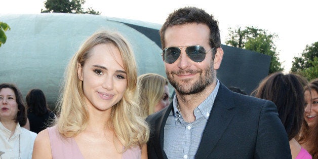 LONDON, ENGLAND - JULY 01: Suki Waterhouse (L) and Bradley Cooper attend The Serpentine Gallery Summer Party co-hosted by Brioni at The Serpentine Gallery on July 1, 2014 in London, England. (Photo by David M. Benett/Getty Images for The Serpentine)