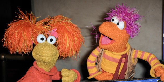 Red Fraggle, left, and Gobo Fraggle arrive at Jim Henson's Fraggle Rock 30th Anniversary at Hollywood Roosevelt Hotel on Wed