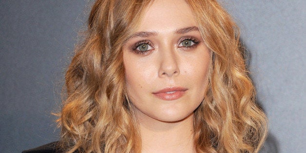 LOS ANGELES, CA - FEBRUARY 20: Actress Elizabeth Olsen arrives at Tom Ford Autumn/Winter 2015 Womenswear Collection Presenta