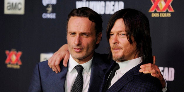 Andrew Lincoln, left, and Norman Reedus, cast members in the television series "The Walking Dead," pose together at a special