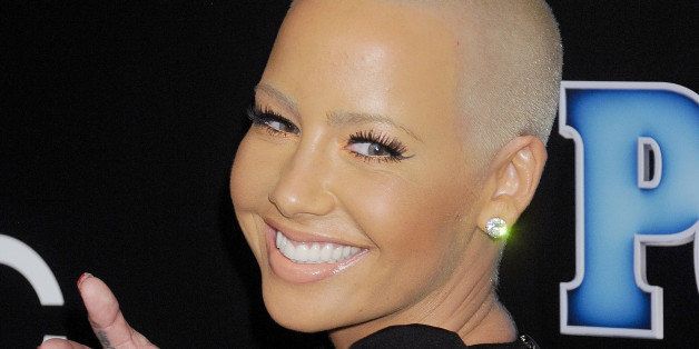 BEVERLY HILLS, CA - DECEMBER 18: Actress/model Amber Rose arrives at The PEOPLE Magazine Awards at The Beverly Hilton Hotel on December 18, 2014 in Beverly Hills, California. (Photo by Gregg DeGuire/WireImage)