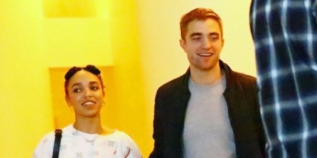 MIAMI, FL - DECEMBER 04: (L-R) Singer FKA Twigs and Robert Pattinson attend a Surface Magazine Event With Hans Ulrich Obrist And FKA Twigs at Edition Hotel on December 4, 2014 in Miami, Florida. (Photo by Astrid Stawiarz/Getty Images for Surface)