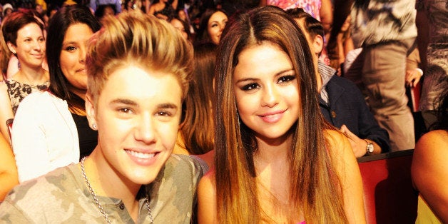 UNIVERSAL CITY, CA - JULY 22: Singer Justin Bieber and actress/singer Selena Gomez attend the 2012 Teen Choice Awards at Gibson Amphitheatre on July 22, 2012 in Universal City, California. (Photo by Kevin Mazur/TCA 2012/WireImage)