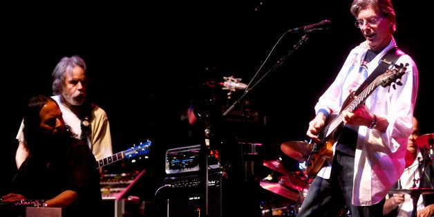 ** FILE ** In this Feb. 4, 2008 file photo, Phil Lesh, right, performs during a fundraising concert in San Francisco while Grateful Dead band mate Bob Weir, standing at left, looks on. The surviving members of the Grateful Dead are turning over the rock band's archives to the University of California at Santa Cruz. Dennis McNally, a spokesman for ex-Dead guitarist Bob Weir, says that Weir and bassist Phil Lesh are going to announce a partnership with the university Thursday, April 24, 2008. (AP Photo/Noah Berger, file)