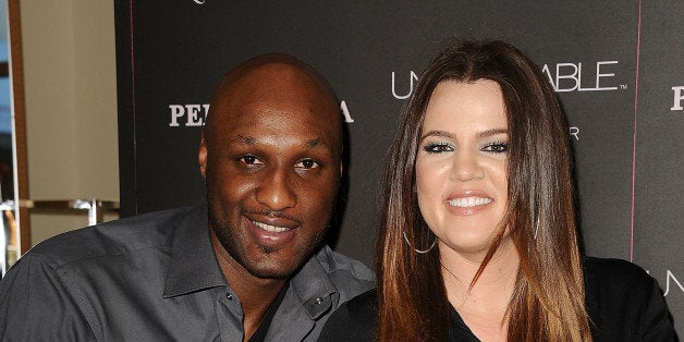ORANGE, CA - JUNE 07: Lamar Odom and Khloe Kardashian make a personal appearance for 'Unbreakable Bond' at Perfumania on Jun