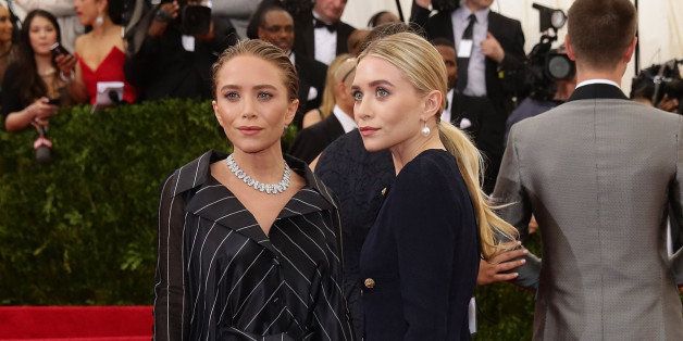 NEW YORK, NY - MAY 05: Ashley Olsen and Mary-Kate Olsen attend the 'Charles James: Beyond Fashion' Costume Institute Gala at the Metropolitan Museum of Art on May 5, 2014 in New York City. (Photo by Neilson Barnard/Getty Images)