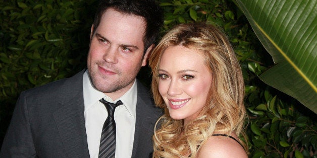 BEVERLY HILLS, CA - MAY 11: Professional hockey player Mike Comrie (L) and wife actress Hilary Duff attend An Evening of 'Southern Style' presented by the St. Bernard Project & the Spears family at a private residence on May 11, 2011 in Beverly Hills, California. (Photo by David Livingston/Getty Images)