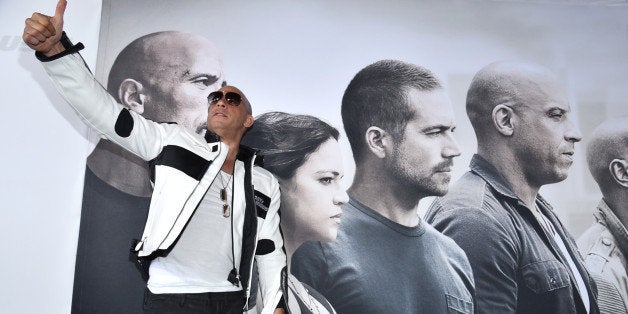 Vin Diesel arrives at the premiere of "Furious 7" at the TCL Chinese Theatre IMAX on Wednesday, April 1, 2015, in Los Angeles. (Photo by John Shearer/Invision/AP)