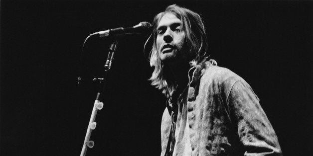 Singer-songwriter and guitarist Kurt Cobain (1967 - 1994) performing with American grunge band Nirvana at Palasport, Modena,