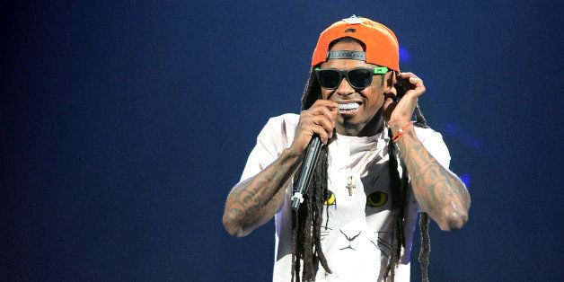 LAS VEGAS, NV - AUGUST 31: Rapper Lil Wayne performs during the America's Most Wanted Music Festival at the MGM Grand Garden Arena on August 31, 2013 in Las Vegas, Nevada. (Photo by Ethan Miller/Getty Images)