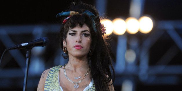 British singer Amy Winehouse performs during the 'Rock in Rio' music festival in Arganda del Rey near Madrid on July 04, 2008. AFP PHOTO/ PIERRE-PHILIPPE MARCOU (Photo credit should read PIERRE-PHILIPPE MARCOU/AFP/Getty Images)