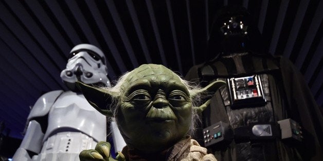 A statue of Yoda is displayed at the preview of the 'Star Wars Vision' exhibition in Tokyo on April 28, 2015. Star Wars-relat