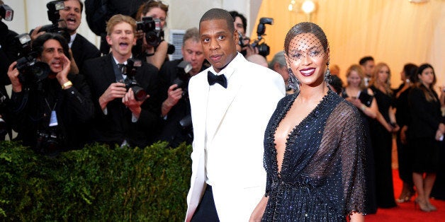 NEW YORK, NY - MAY 05: Jay-Z (L) and Beyonce attend the 'Charles James: Beyond Fashion' Costume Institute Gala at the Metropolitan Museum of Art on May 5, 2014 in New York City. (Photo by Mike Coppola/Getty Images)