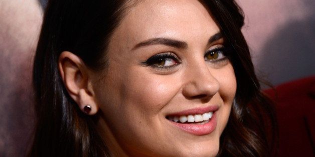 HOLLYWOOD, CA - FEBRUARY 02: Actress Mila Kunis arrives at the Premiere of Warner Bros. Pictures' 'Jupiter Ascending' at TCL Chinese Theatre on February 2, 2015 in Hollywood, California. (Photo by Frazer Harrison/Getty Images)