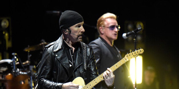 VANCOUVER, BC - MAY 14: Musicians The Edge (L) and Bono of U2 perform onstage during the U2 iNNOCENCE + eXPERIENCE tour opener in Vancouver at Rogers Arena on May 14, 2015 in Vancouver, Canada. (Photo by Kevin Mazur/WireImage)