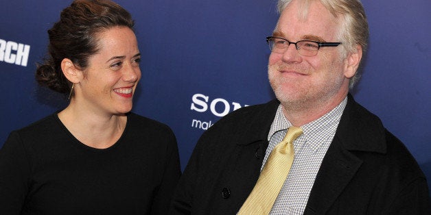 NEW YORK, NY - OCTOBER 05: Mimi O'Donnell and actor Philip Seymour Hoffman attend the premiere of 'The Ides of March' at the