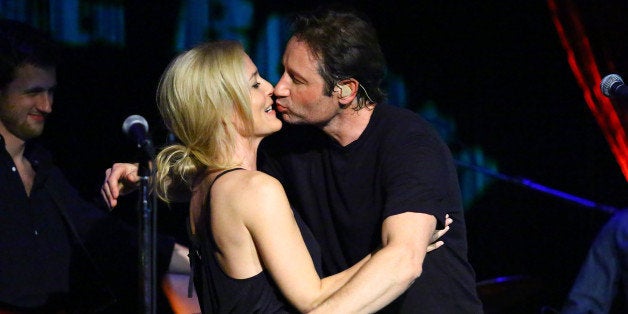 NEW YORK, NY - MAY 12: (L-R) Actors Gillian Anderson and David Duchovny attend David Duchovny in concert at The Cutting Room on May 12, 2015 in New York City. (Photo by Astrid Stawiarz/Getty Images)