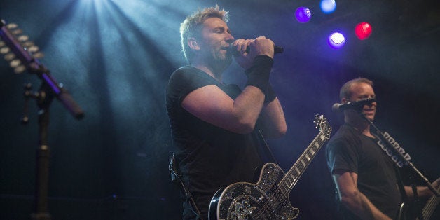 WEST HOLLYWOOD, CA - NOVEMBER 05: Chad Kroeger of Nickelback performs on stage at the special announcement and live performance at the House of Blues on the Sunset Strip November 5, 2014 in West Hollywood, California. (Photo by Mark Davis/Getty Images)