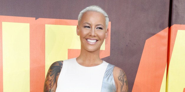 LOS ANGELES, CA - APRIL 12: Model Amber Rose attends The 2015 MTV Movie Awards at Nokia Theatre L.A. Live on April 12, 2015 in Los Angeles, California. (Photo by Rich Polk/Getty Images for MTV)