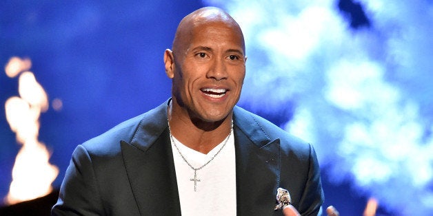 CULVER CITY, CA - JUNE 06: Actor Dwayne Johnson accepts the Troops' Choice award onstage during Spike TV's Guys Choice 2015