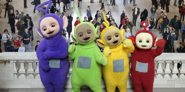 New York, UNITED STATES: The world famous Teletubbies (L-R) Tinky-Winky,Dipsy, Laa-Laa and Po pose on the balcony at Grand Ce
