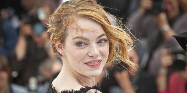 Emma Stone poses for photographers during a photo call for the film Irrational Man, at the 68th international film festival,