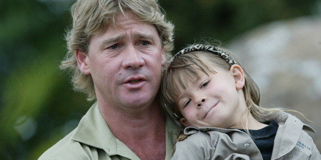 SUNSHINE COAST, AUSTRALIA - JANUARY 3: (EUROPE AND AUSTRALASIA OUT) Steve Irwin and daughter Bindi gives a press conference outside his Australia Zoo at Beerwah on the Sunshine Coast defending his actions in taking son Bob (1 mth) into fenced crocodile enclosure on January 2, 2004. (Photo by Graeme Parkes/Newspix/Getty Images)