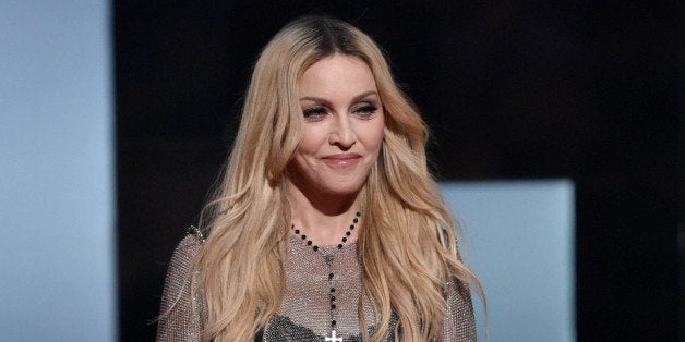 Madonna speaks on stage at the iHeartRadio Music Awards at The Shrine Auditorium on Sunday, March 29, 2015, in Los Angeles.
