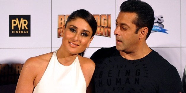 Indian Bollywood actress Kareena Kapoor Khan (L) poses alongside actor Salman Khan during the trailer launch of the forthcoming Hindi film Bajrangi Bhaijaan directed by Kabir Khan, produced by Salman Khan and Rockline Venkatesh in Mumbai late June 18, 2015. AFP PHOTO/STR (Photo credit should read STRDEL/AFP/Getty Images)