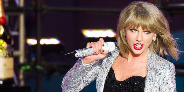 Taylor Swift performs in Times Square during New Year's Eve celebrations on Wednesday, Dec. 31, 2014 in New York. (Photo by Charles Sykes/Invision/AP)