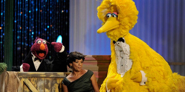 Telly Monster, left, Sonia Manzano, center, and Big Bird perform at the Daytime Emmy Awards on Sunday Aug. 30, 2009,in Los Angeles. (AP Photo/Chris Pizzello)