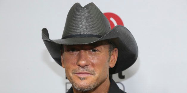 Tim McGraw arrives at the iHeartRadio Country Festival held at the Frank Erwin Center on Saturday, May 2, 2015 in Austin, Texas. (Photo by Jack Plunkett/Invision/AP)