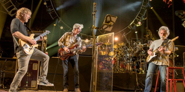 Trey Anastasio, from left, Phil Lesh, Bob Weir of The Grateful Dead perform at Grateful Dead Fare Thee Well Show at Soldier Field on Saturday, July 4, 2015, in Chicago, Ill. (Photo by Jay Blakesberg/Invision for the Grateful Dead/AP Images)