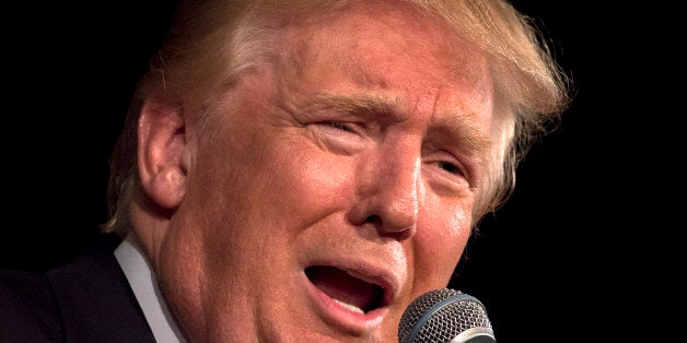 Republican presidential hopeful Donald Trump speaks at his South Carolina Campaign Kickoff Rally in Bluffton, S.C., Tuesday, July 21, 2015. Donald Trump wouldn't apologize after questioning whether Sen. John McCain -- who spent five years as a prisoner during the Vietnam War -- is a war hero. (AP Photo/Stephen B. Morton)