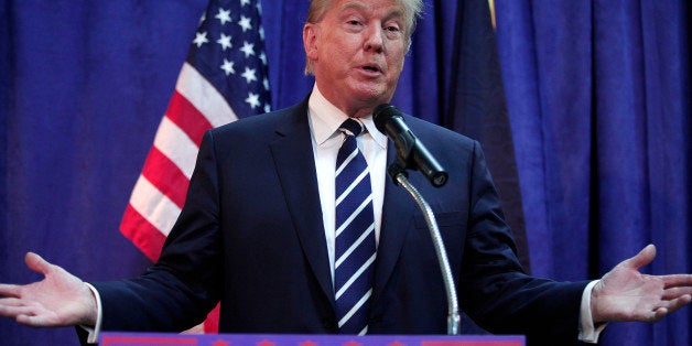 BIRCH RUN, MI - AUGUST 11: Republican presidential candidate Donald Trump speaks at a press conference before delivering the keynote address at the Genesee and Saginaw Republican Party Lincoln Day Event August 11, 2015 in Birch Run, Michigan. This is Trump's first campaign event since his Republican debate last week. (Photo by Bill Pugliano/Getty Images)