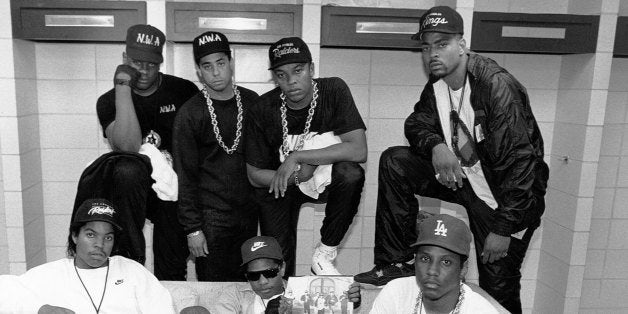 KANSAS CITY - JUNE 1989: Rap group N.W.A. pose with rappers The D.O.C. and Laylaw from Above The Law (L-R standing: Laylaw,