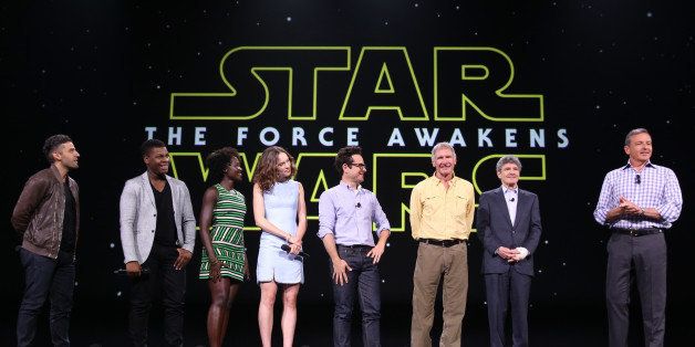 ANAHEIM, CA - AUGUST 15: (L-R) Actors Oscar Isaac, John Boyega, Lupita Nyong'o, Daisy Ridley, director J.J. Abrams and actor Harrison Ford of STAR WARS: THE FORCE AWAKENS, Chairman of the Walt Disney Studios Alan Horn and The Walt Disney Company Chairman and CEO Bob Iger took part today in 'Worlds, Galaxies, and Universes: Live Action at The Walt Disney Studios' presentation at Disney's D23 EXPO 2015 in Anaheim, Calif. (Photo by Jesse Grant/Getty Images for Disney)