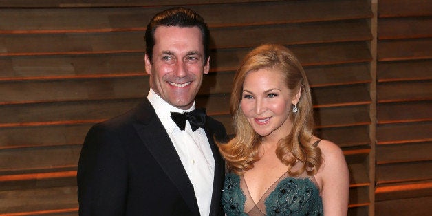 WEST HOLLYWOOD, CA - MARCH 02: Actors John Hamm (L) and Jennifer Westfeldt attend the 2014 Vanity Fair Oscar Party hosted by Graydon Carter on March 2, 2014 in West Hollywood, California. (Photo by David Livingston/Getty Images)