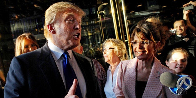 Donald Trump makes a point as he walks with former governor of Alaska Sarah Palin in New York City as they make their way to