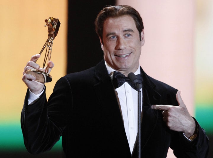 John Travolta Bald Caught Without His Hair Piece Photos Huffpost