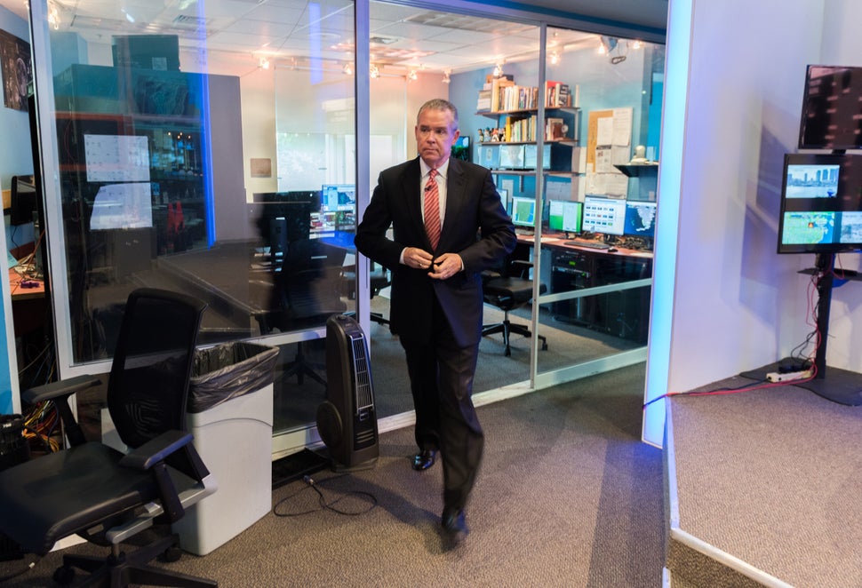 John Morales leaves the meteorology office at NBC-6 to go to the green-screen studio for his nightly...