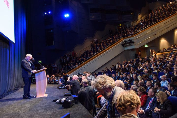 Boris Johnson addresses over 1,000 fans at the Tory conference as he trashes the PM's Brexit proposal.