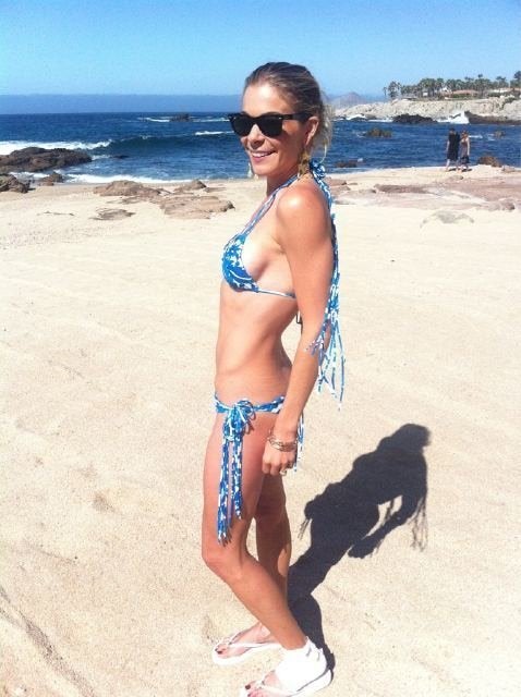 It was displayed at the pool with a too small bikini. LeAnn Rimes Images