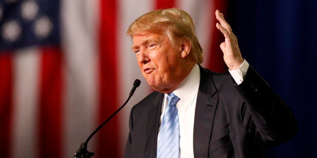 Republican presidential candidate, businessman Donald Trump speaks during a rally at the Greater Columbus Convention Center in Columbus, Ohio, Monday, Nov. 23, 2015. (AP Photo/Paul Vernon)