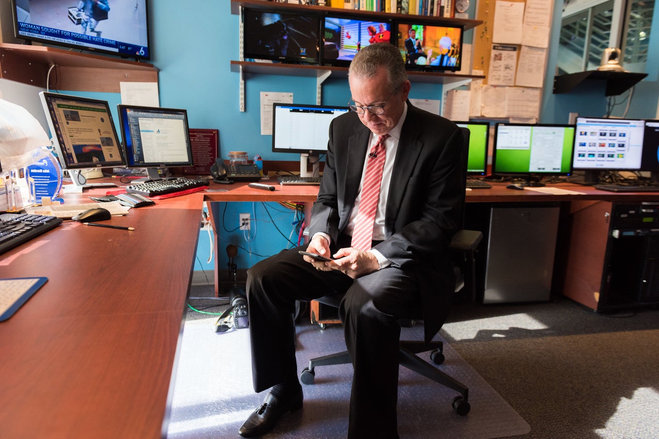 Morales takes time to reply to text messages in between weather reports. He has begun working on a master's in environmental science and policy.