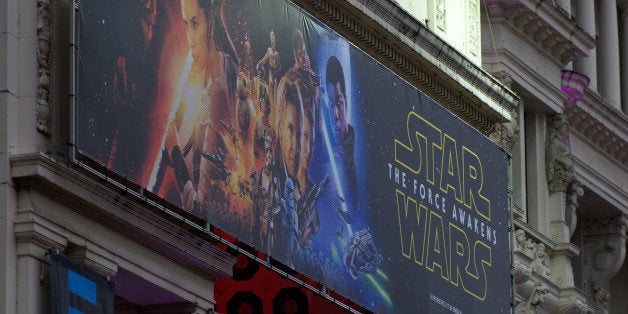 LONDON, ENGLAND - DECEMBER 15: Star Wars promotional posters are setup in Leicester Square ahead of the European film premiere of Star Wars: The Force Awakens on December 15, 2015 in London, England. The film starring members of the original cast including Harrison Ford, Mark Hamill, Carrie Fisher is the seventh film in the Star Wars franchise and is directed by . J. Abrams. (Photo by Ben Pruchnie/Getty Images)